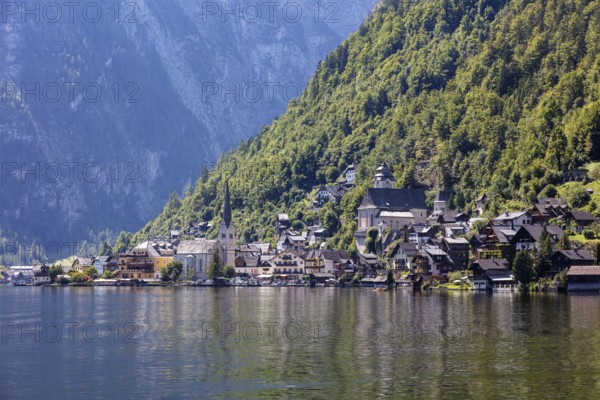 A, Hallstatt, A picturesque lakeside mountain village surrounded by steep, wooded slopes, Austria