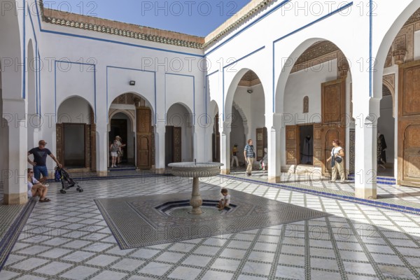 Moroccan courtyard with typical arches and fountains decorated with tiles at home in the sun, Bahia