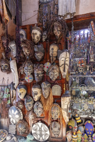Wall with traditional African wooden masks, decorative and artistic