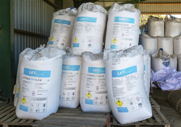 MYPREMIAN ammonium nitrate LAR nitrogen fertiliser bags stored in farm barn, Suffolk, England, UK
