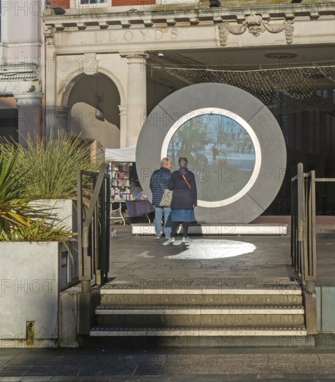 People on the Cornhill in the town centre view the first ever UK Portal in Ipswich, Suffolk,