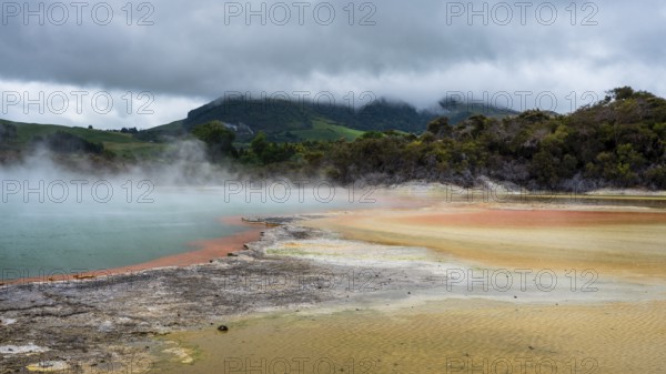 The champagne pool in the Waiotapu geothermal area (Wai-O-Tapu) . orange and yellow. Waiotapu,