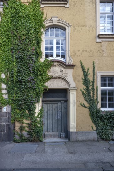 Stucco decoration above the entrance to Johanneum, built in 1905, near St. Johannis 1-3, Hanseatic