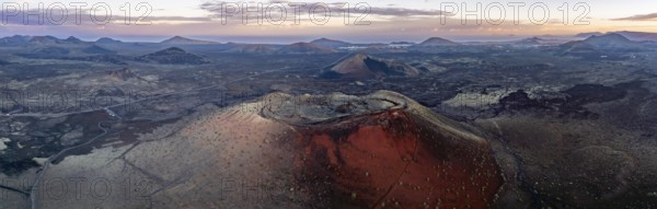 Caldera Colorada volcano, picturesque volcanic landscape with volcanic craters at sunrise, Los
