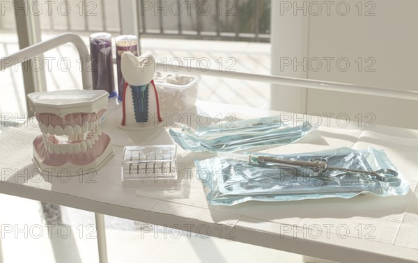 Sterile medical instruments, lying on a tray in protective packaging, dentist's instruments,