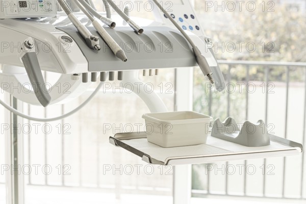 Dental equipment, doctor's unit, module, in a bright clinic, with modern technology, no people,