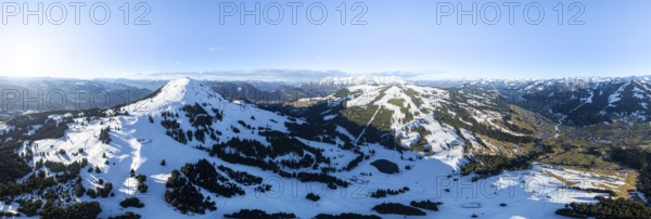 Wonderful winter landscape with Hohe Salve, blue sky and snow, mountains and mountain valley,