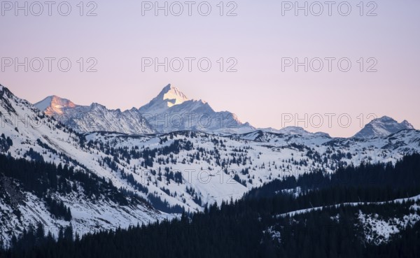 Summit of Grossglockner at sunset in winter, Hochbrixen, Brixen im Thale, Tyrol, Austria