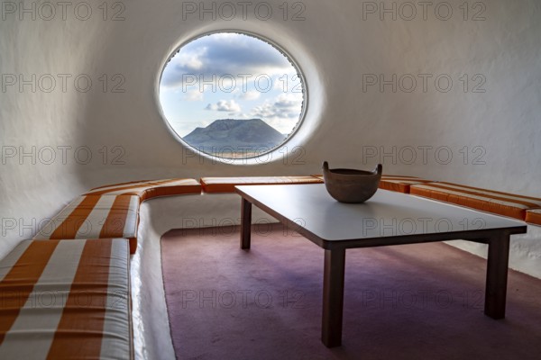 Sitting area with a view of the Volcán de la Corona volcano, interior at the Mirador del Río