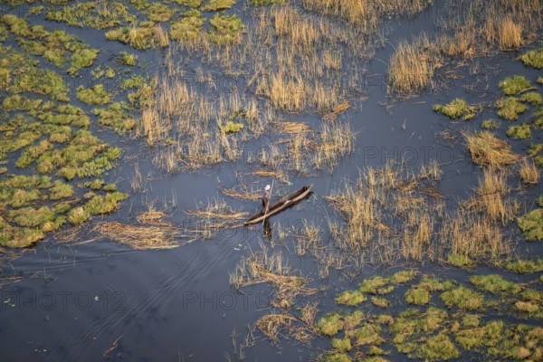Marshland, marshland, Kavango fishermen with dugout boat, Mokoro, aerial view, Okavango Delta,