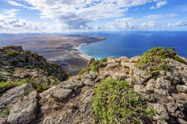 Castillejo viewpoint, view from the Risco de Famara cliffs to the coast and the sea with the Famara