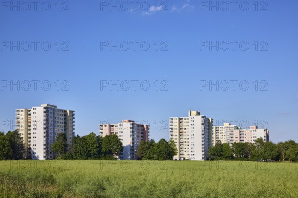 View of skyscrapers on Niederhöchstädter Straße, residential buildings, trees, cultivated