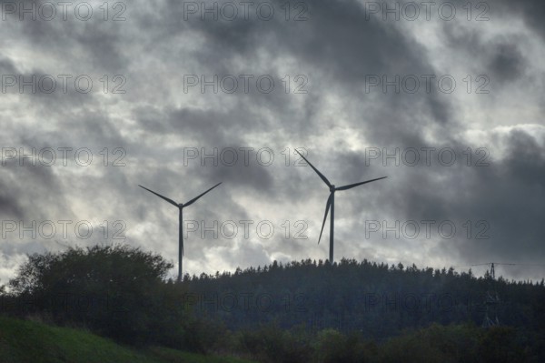 Wind turbines in thunderstorm rain, Bavarian Forest, Bavaria, Germany