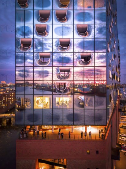 Aerial view of the Elbe Philharmonic Hall with reflections on the façade in the evening light above