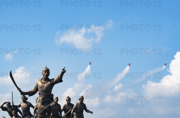 Indian Air Force aerobatic team performs during rehearsals ahead of the air show organised as part