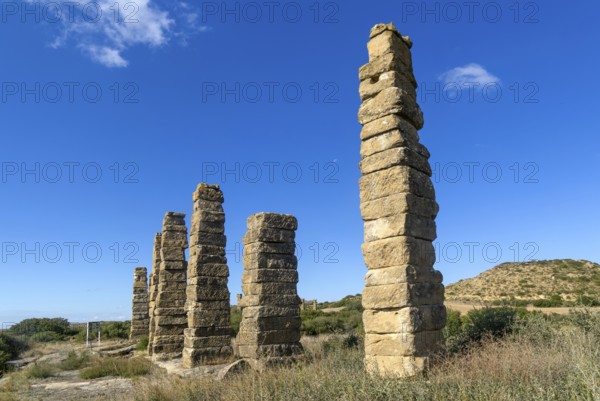 Stone columns of ancient aqueduct, Roman site of Los Banales, near Layana, Zaragoza province,