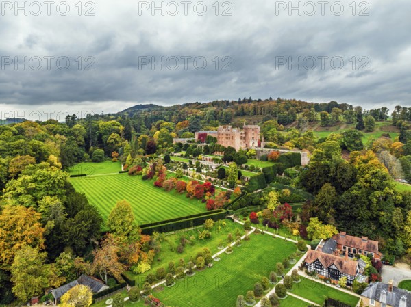 Autumn colours over Powis Castle and Garden from drone, Welshpool, Powys, Wales, England, United