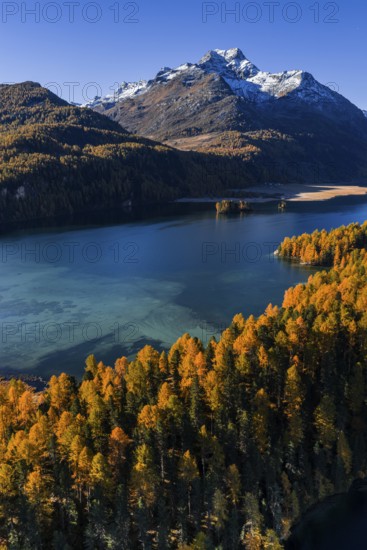 Mountain landscape, mountain lake, larch forest, autumn, autumn color, morning light, sunny, aerial