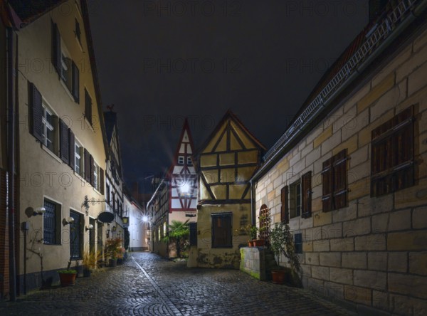 Nocturnal view of an old town alleyway with historic buildings, Lauf an der Pegnitz, Middle