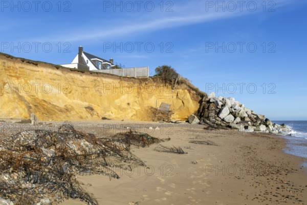 Clifftop houses at risk from coastal erosion, Thorpeness, Suffolk, North Sea coast, England, UK