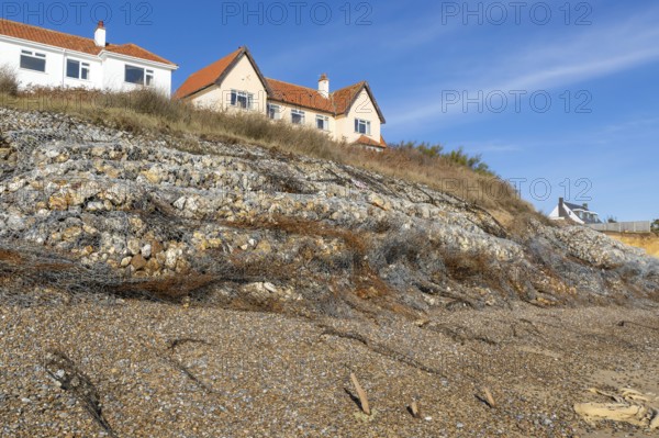Clifftop houses at risk from coastal erosion, Thorpeness, Suffolk, North Sea coast, England, UK