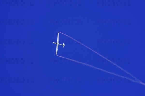 An SZD-59-1 ACRO glider, registration D-1138, during a demonstration as part of an air show at the