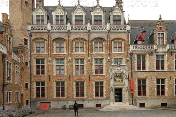 Gruuthusemuseum with equestrian statue of Lodewijk van Gruuthuse above the entrance portal in the
