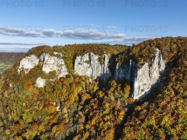 Aerial view of the Upper Danube Valley surrounded by autumn vegetation with the Hausender Peaks
