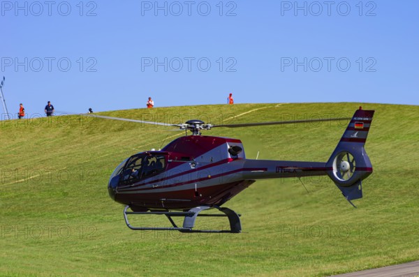 A Eurocopter EC 120B Colibri helicopter, D-HALX registration, during a flight demonstration as part