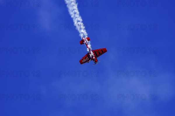 A Soviet Jakovlev Jak-55 sport aircraft with the registration LY-TOY during a flight demonstration