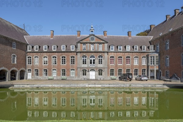 16th century Classicist Château de Franc-Waret in Louis XV style, moated castle in the village