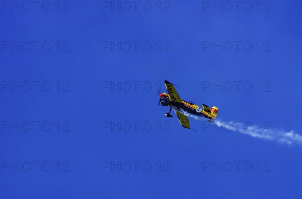 A Votec 351 sport aircraft from the Swiss MSW Aviation AG with registration HB-YMV during a flight