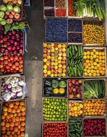 Fresh fruits and vegetables in a market display, aerial view perpendicular top down, healthy eating
