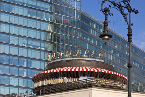 Café Kranzler with historic lantern and modern office building on Kurfürstendamm, Charlottenburg,