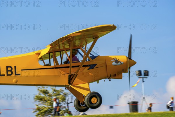 A Piper PA-18 Super Cub of the Bravo Lima Formation during a flight demonstration as part of an air