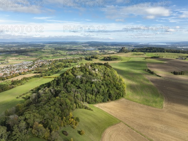 Aerial view of the Hegau volcano and the Mägdeberg castle ruins, with the Hohenkrähen and Lake