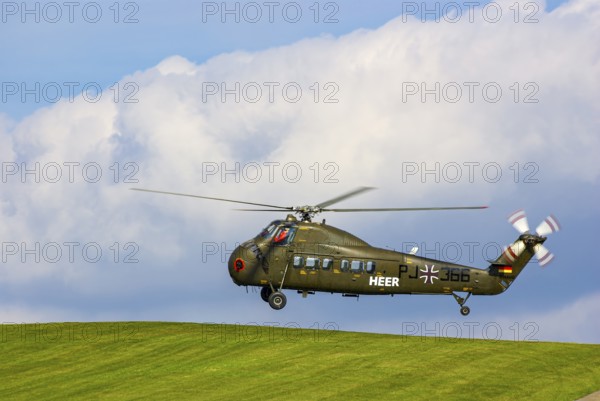 A Sikorsky S-58C transport helicopter in the colours of the German Army with the registration