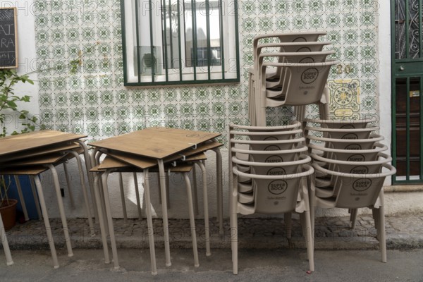 Restaurant furniture, for outdoor catering, tables, chairs, stacked, day off, catering closed, old