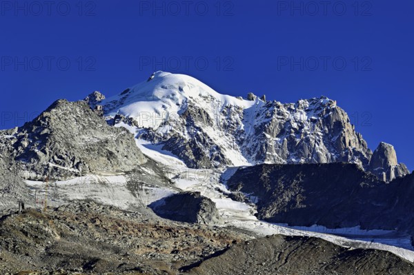 Aiguille des Grands Montets and snow-covered Aiguille Verte, Chamonix-Mont-Blanc, Haute-Savoie,