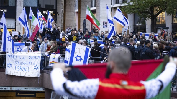 Numerous people gather for a vigil at the Hauptwache in Frankfurt am Main on the second anniversary