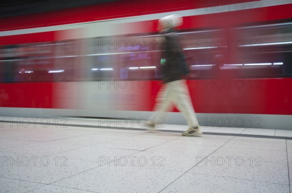 Underground arriving S-Bahn, train, class 420 in traffic red, platform, stop, Stadtmitte station,
