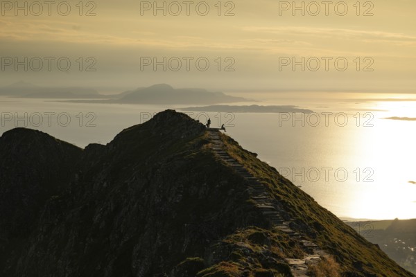 Hikers on the Rørsethornet stone staircase, with 3292 steps one of the longest continuous stone