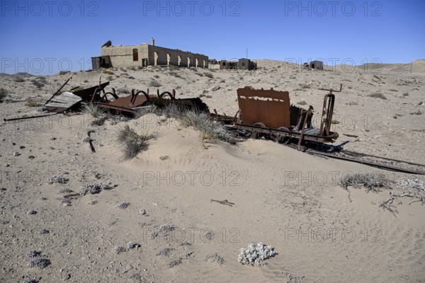 Wagon of an old narrow-gauge railway in the desert sand, Pomona, restricted diamond area, near