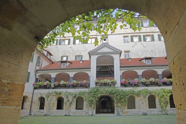 Protestant monastery built in 1534, inner courtyard with arcade and floral decoration, archway,