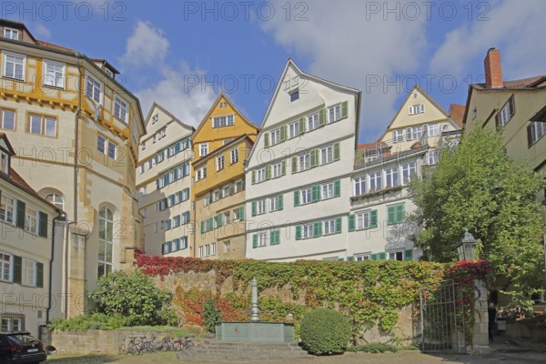 View from the inner courtyard of the Protestant monastery to houses with shutters in the