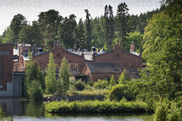 Brick factory building, former paper factory and mill for the production of groundwood pulp board,
