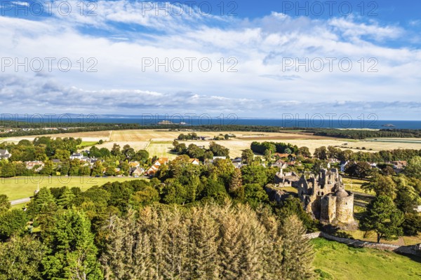 Ruins of Dirleton Castle & Gardens from a drone, Dirleton, East Lothian, Scotland, UK