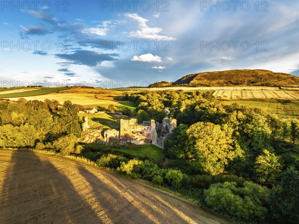 Ruins of Hailes Castle over River Tyne from a drone, East Linton, East Lothian, Scotland, UK
