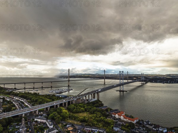 Rain clouds over Forth Road Bridge and The Queensferry Crossing from a drone, Queensferry Crossing,