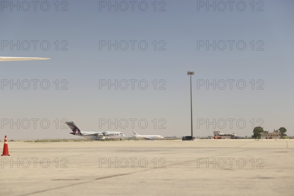A Qatari aircraft carrying humanitarian and medical aid arrives at Damascus International Airport,